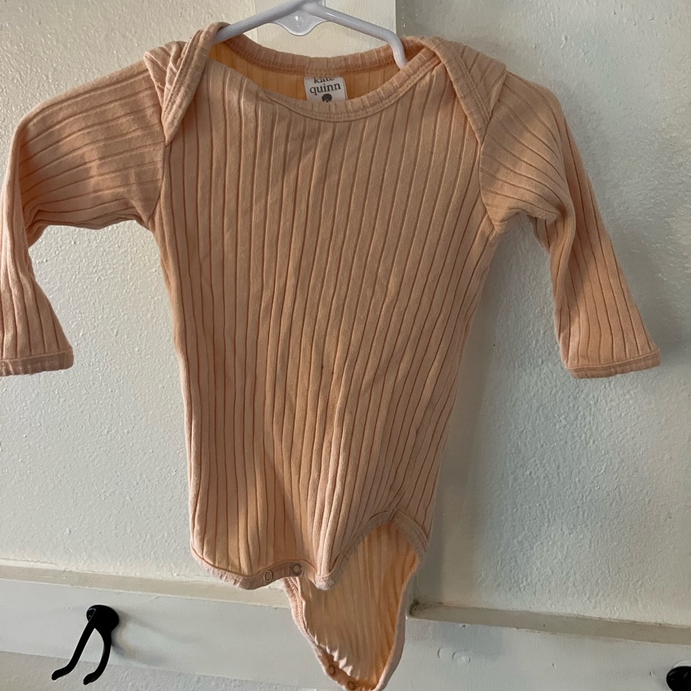 Kate Quinn Peach Ribbed Bodysuit